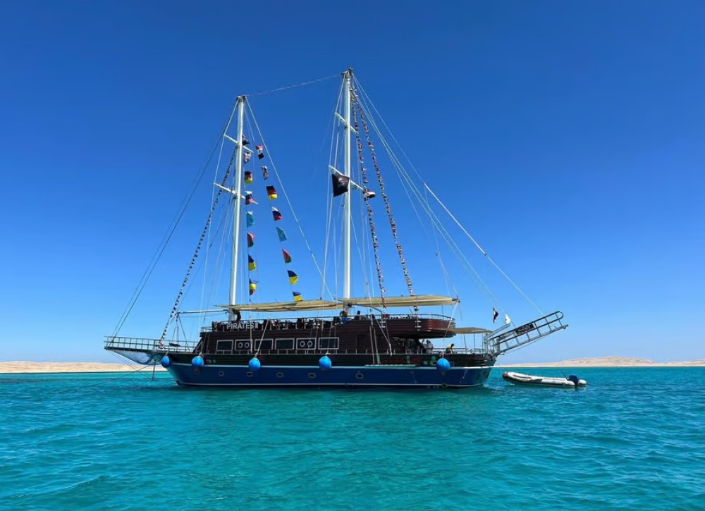 Hurghada: Pirates Sailing Boat to Orange Bay with Transfers | ®ExcursionMania