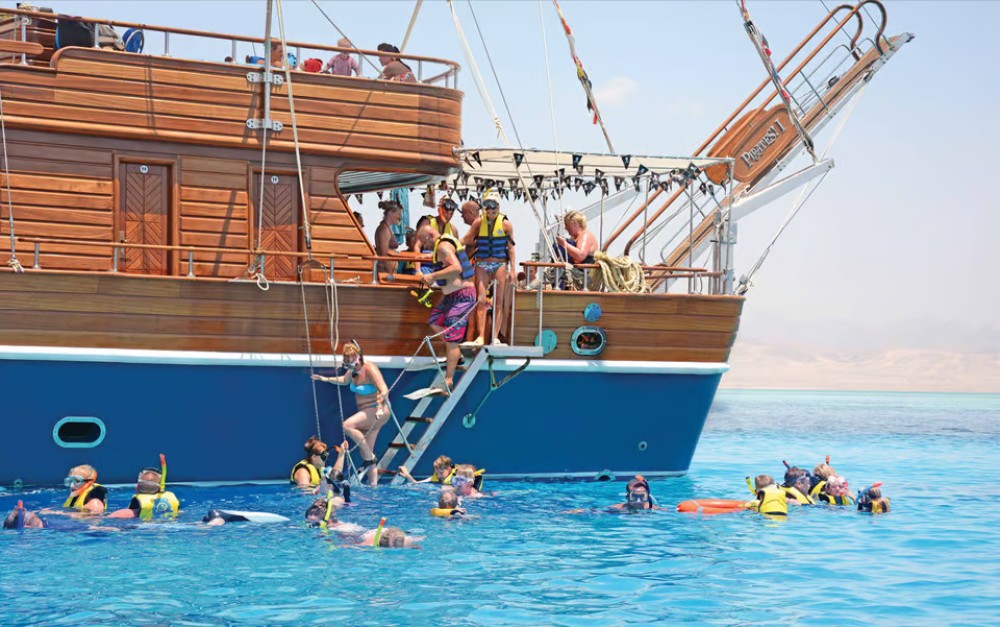 Hurghada: Pirates Sailing Boat to Orange Bay with Transfers | ®ExcursionMania