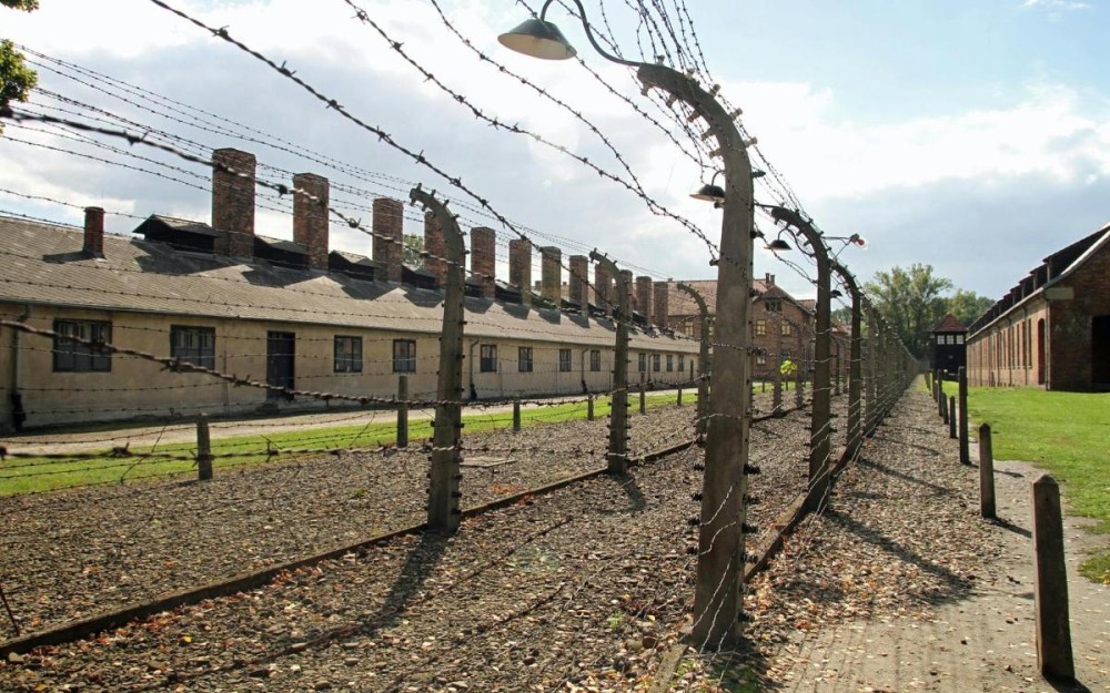 Krakow: Auschwitz-Birkenau Guided Tour with Hotel Transfer | ®ExcursionMania