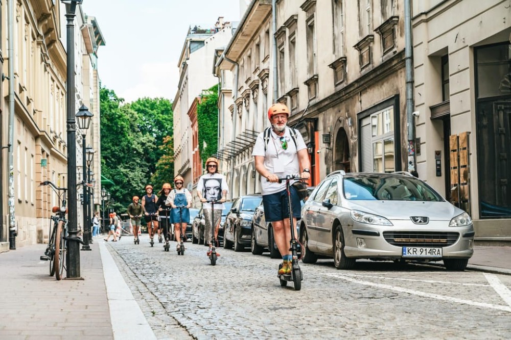 Krakow: Guided E-Scooter City Tour with Food Tastings | ®ExcursionMania