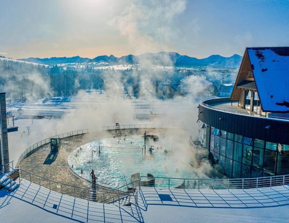 Krakow: Snowmobile Ride with Thermal Pools and Hotel Pickup | ®ExcursionMania