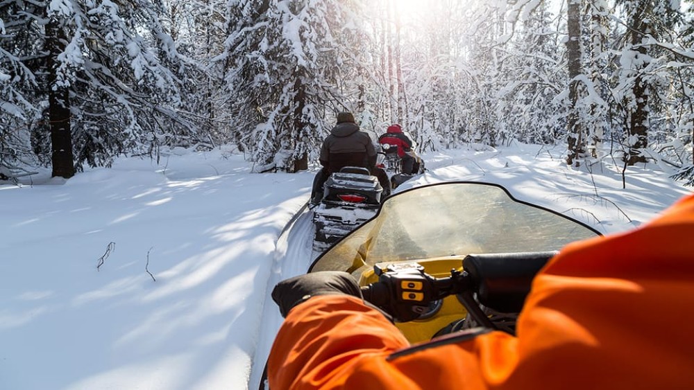 Krakow: Snowmobile Ride with Thermal Pools and Hotel Pickup | ®ExcursionMania