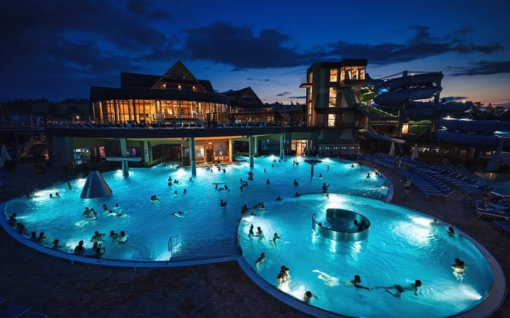 Krakow: Snowmobile Ride with Thermal Pools and Hotel Pickup | ®ExcursionMania
