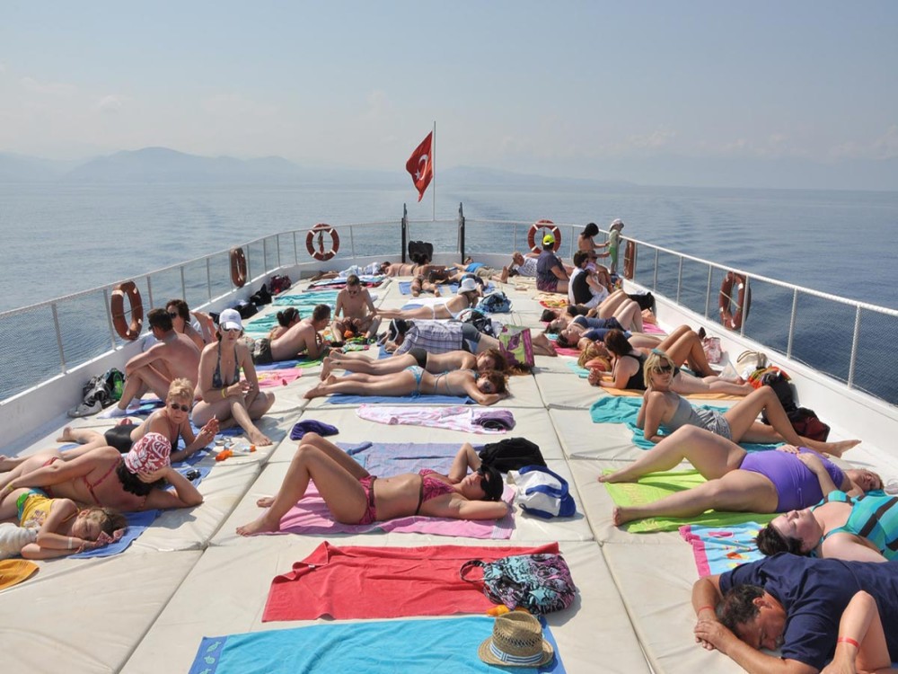 From Kusadasi: Boat Tour & Lunch w/ Transfers | ®ExcursionMania
