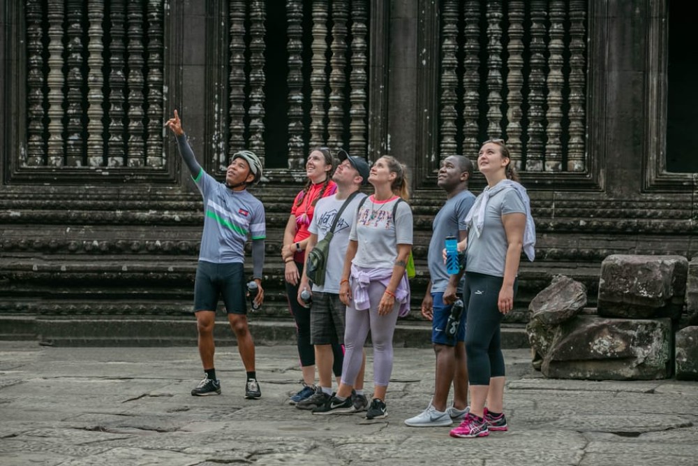 Angkor Wat: Guided Sunrise Bike Tour w/ Breakfast and Lunch | ®ExcursionMania