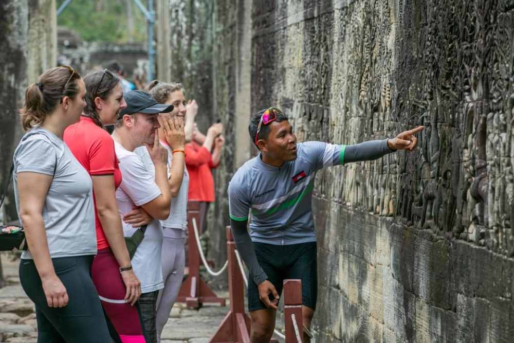Angkor Wat: Guided Sunrise Bike Tour w/ Breakfast and Lunch | ®ExcursionMania