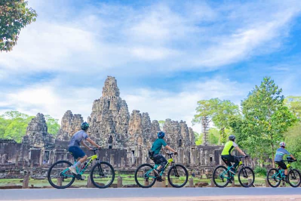Siem Reap: Angkor Sunset Bike & Boat Tour w/ Drinks & Snacks | ®ExcursionMania