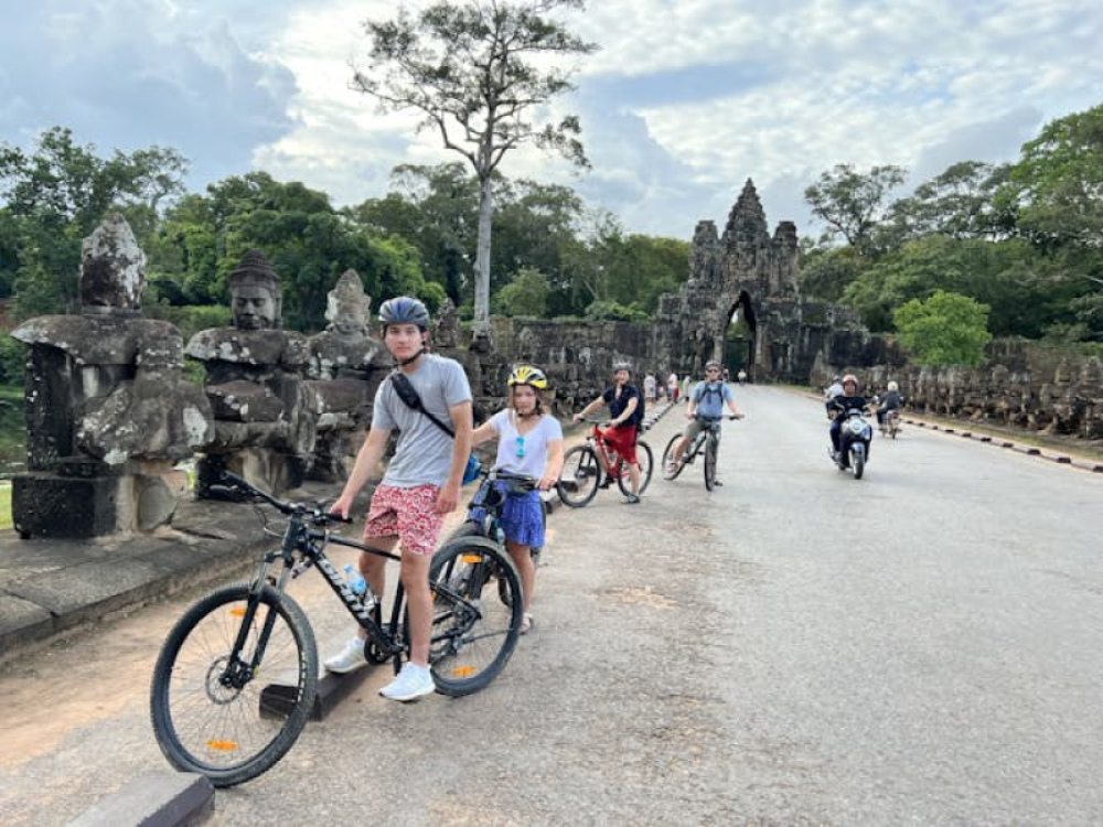 Siem Reap: Angkor Sunset Bike & Boat Tour w/ Drinks & Snacks | ®ExcursionMania