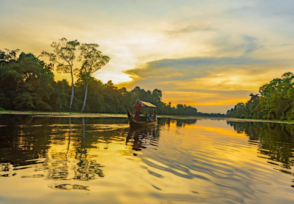 Siem Reap: Angkor Sunset Bike & Boat Tour w/ Drinks & Snacks | ®ExcursionMania