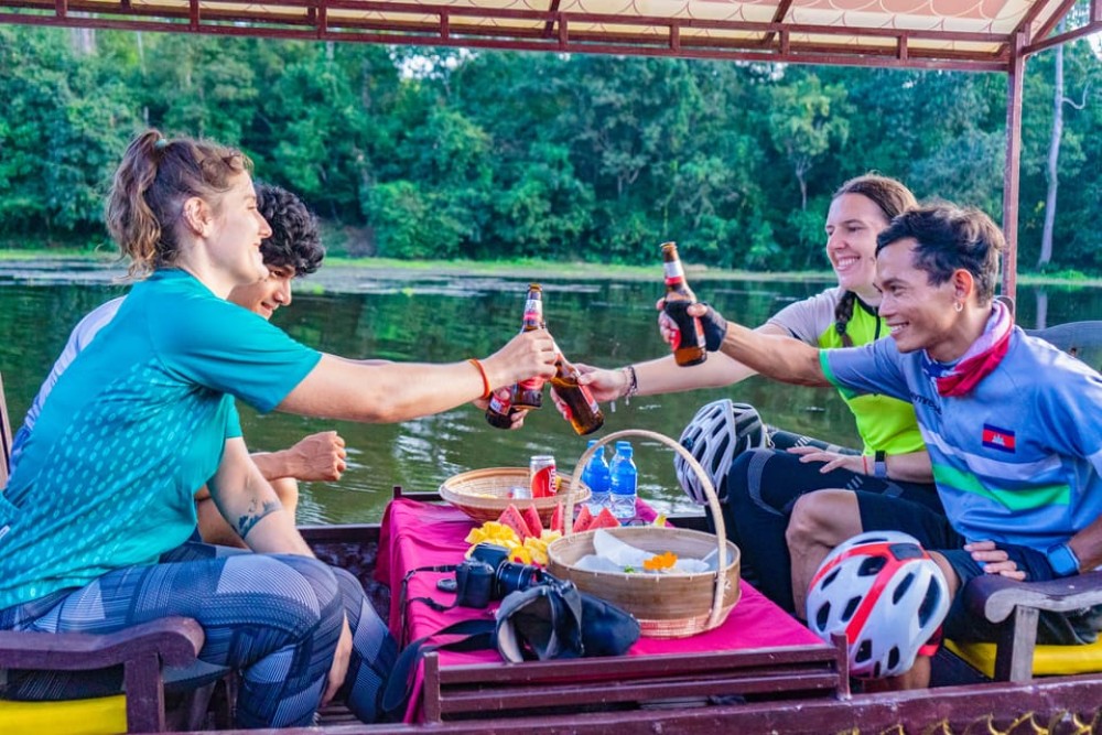 Siem Reap: Angkor Sunset Bike & Boat Tour w/ Drinks & Snacks | ®ExcursionMania