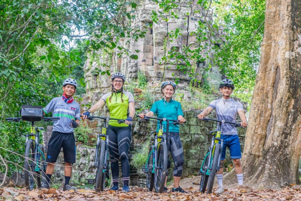 Siem Reap: Angkor Sunset Bike & Boat Tour w/ Drinks & Snacks | ®ExcursionMania