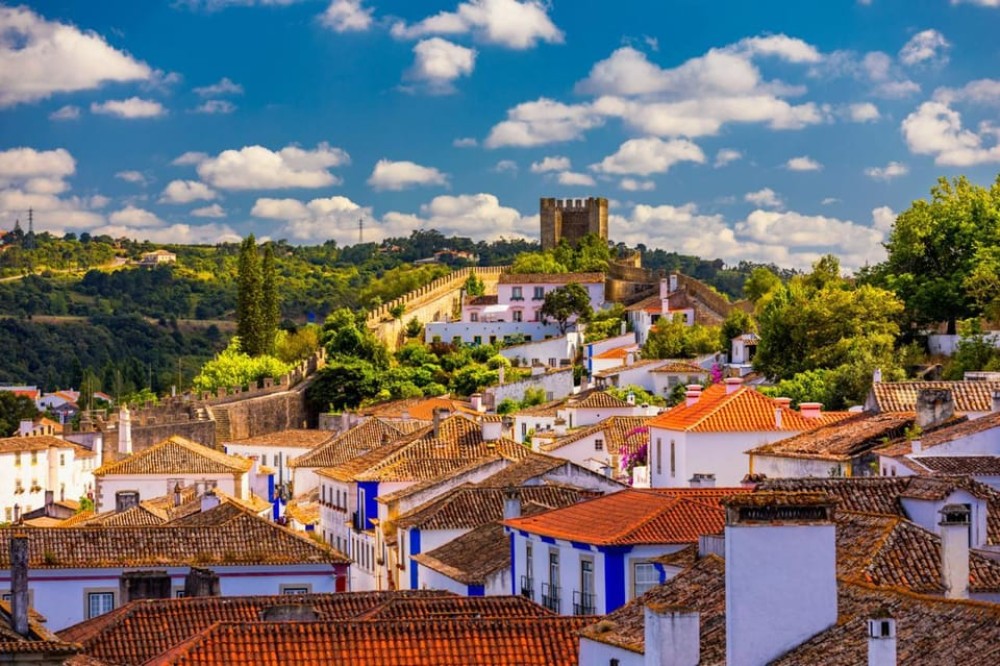 From Lisbon: Fatima, Batalha, Nazare, Obidos - Small Group | ®ExcursionMania
