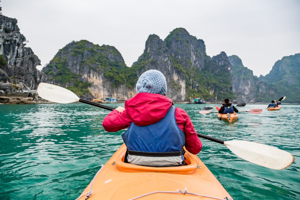 Join-in Day Tour 6 hours Cruising Cave, Kayak, Beach, Lunch | ®ExcursionMania