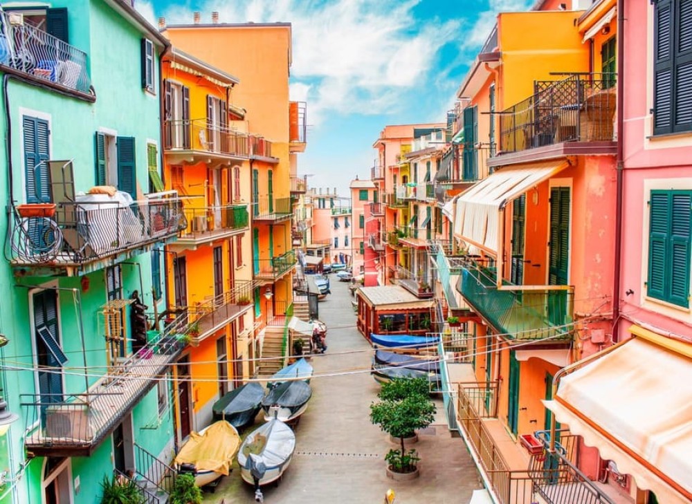 From Milan: Cinque Terre Day Trip with Boat Tour | ®ExcursionMania