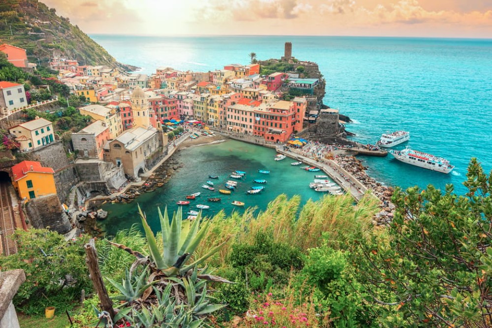 From Milan: Cinque Terre Day Trip with Boat Tour | ®ExcursionMania