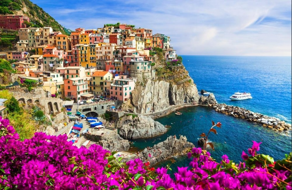 From Milan: Cinque Terre Day Trip with Boat Tour | ®ExcursionMania