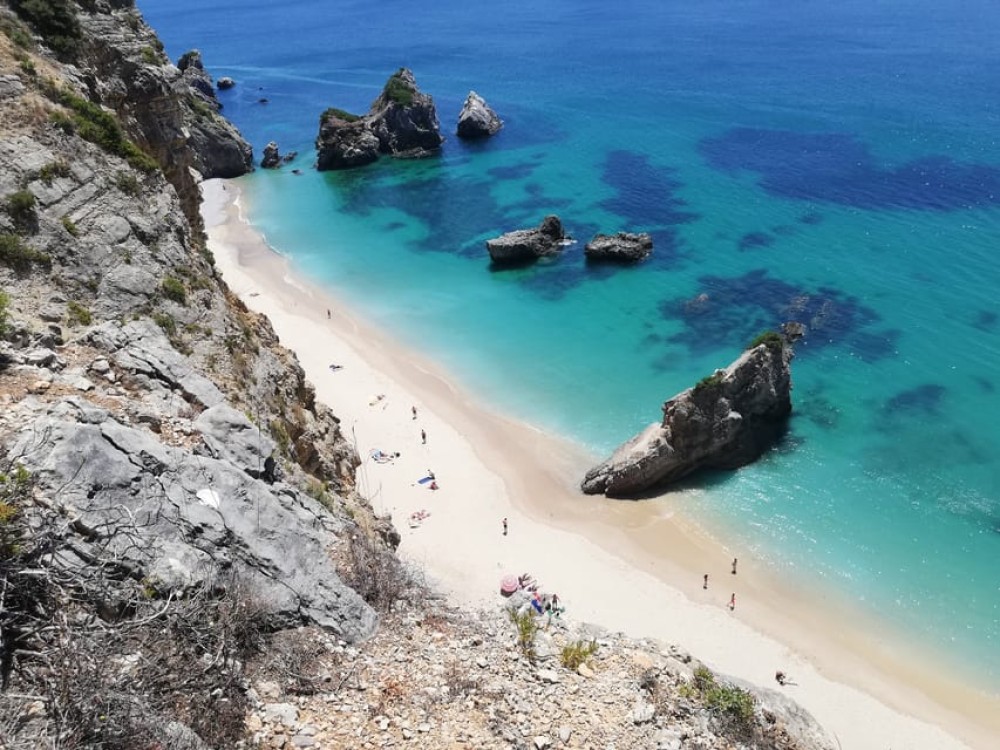 Lisbon: Full-Day Sesimbra Kayak Tour with Picnic | ®ExcursionMania