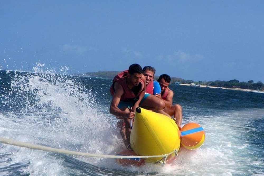 Day Tour Bali Water Sport and Uluwatu Sunset with Kecak Dance | ®ExcursionMania