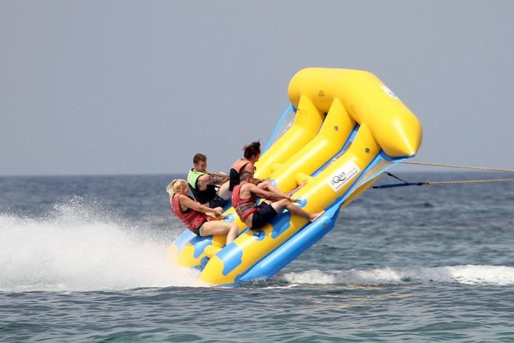 Day Tour Bali Water Sport and Uluwatu Sunset with Kecak Dance | ®ExcursionMania
