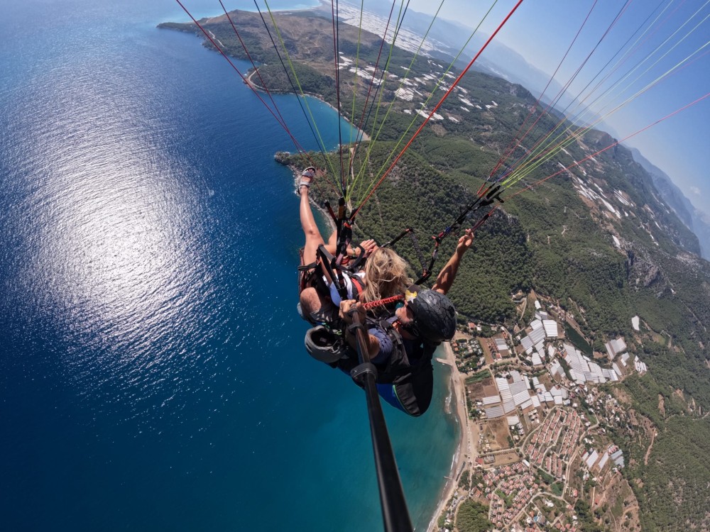 From Antalya: Paragliding Flight at Olympos Tahtali Mountain | ®ExcursionMania