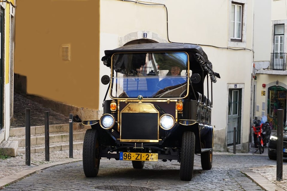 Lisbon: Vintage vehicle replica Private Tour | ®ExcursionMania