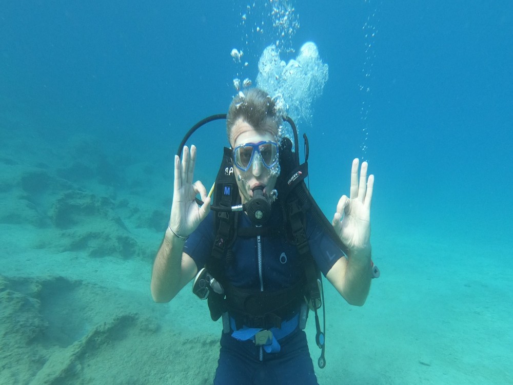 Scuba Diving Adventure in the Crystal-Clear Waters of Kaş | ®ExcursionMania