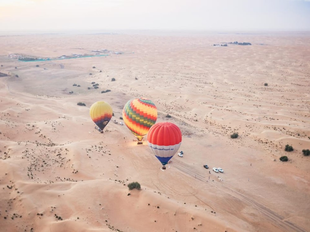 Dubai: Sunrise Balloon Flight with Camel Ride  Breakfast | ®ExcursionMania