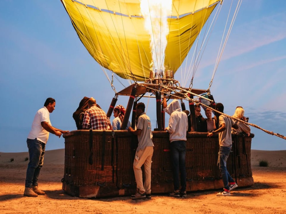 Dubai: Sunrise Balloon Flight with Camel Ride  Breakfast | ®ExcursionMania