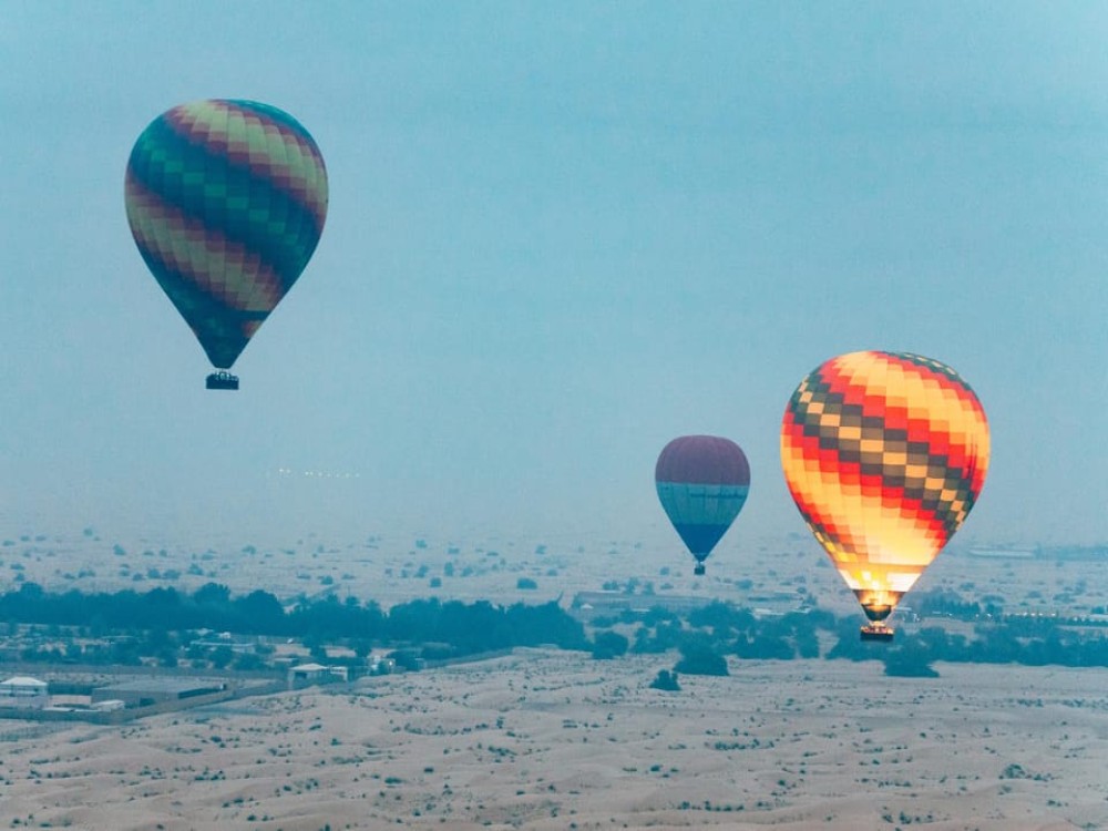 Dubai: Sunrise Balloon Flight with Camel Ride  Breakfast | ®ExcursionMania