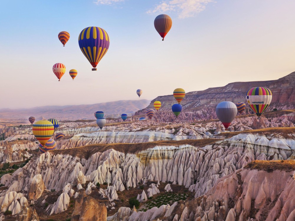 Cappadocia: Goreme Sunrise Hot Air Balloon Ride w/ Breakfast | ®ExcursionMania