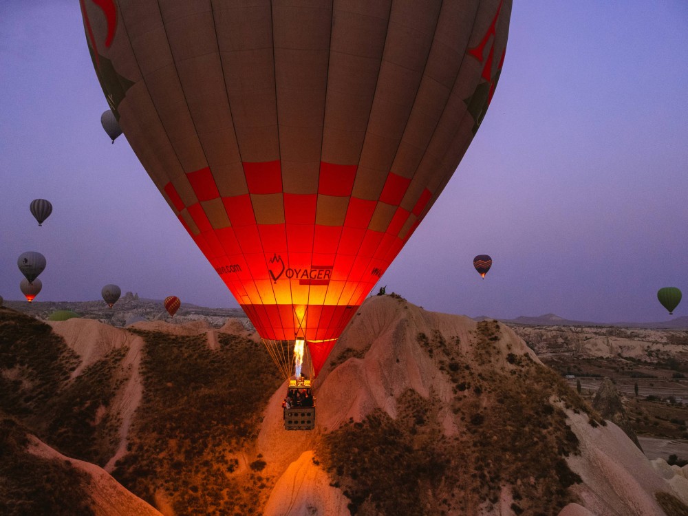 Cappadocia: Goreme Sunrise Hot Air Balloon Ride w/ Breakfast | ®ExcursionMania