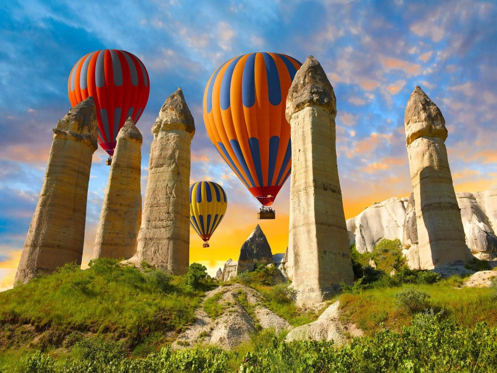 Cappadocia: Goreme Sunrise Hot Air Balloon Ride w/ Breakfast | ®ExcursionMania