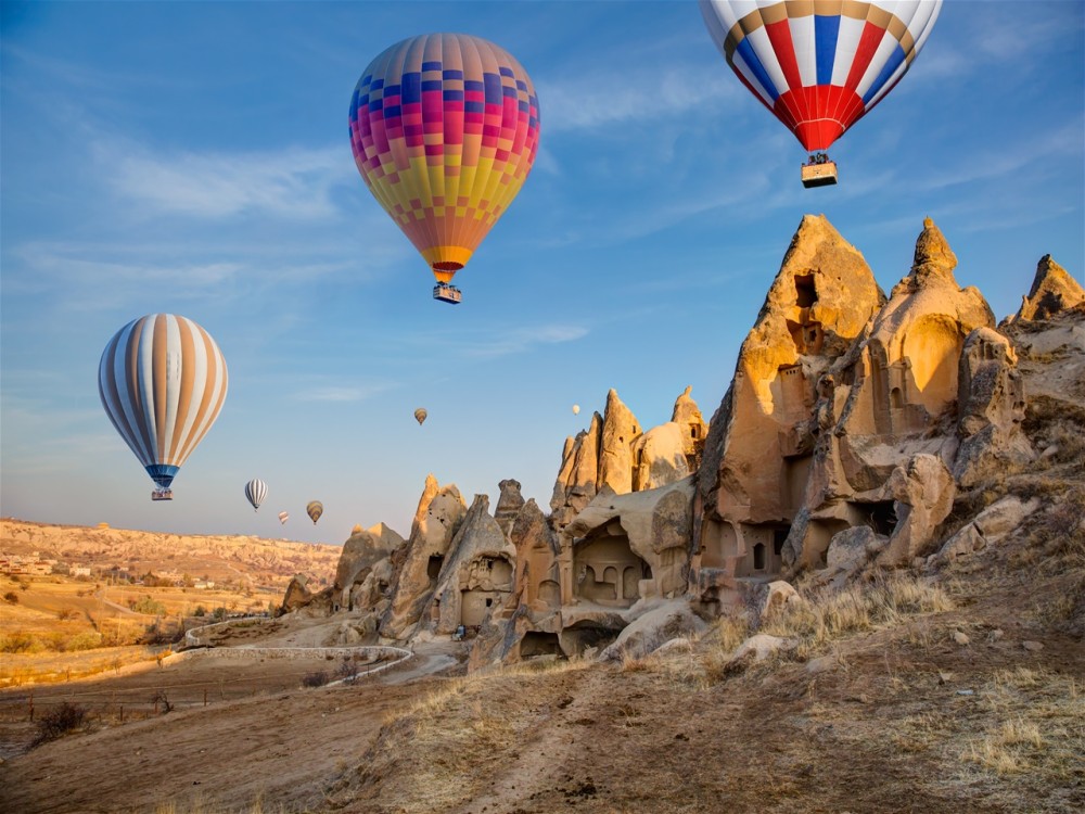 Cappadocia: Goreme Sunrise Hot Air Balloon Ride w/ Breakfast | ®ExcursionMania