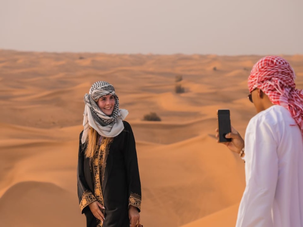 Abu Dhabi: Desert Safari with BBQ Camel Ride & Sandboarding | ®ExcursionMania