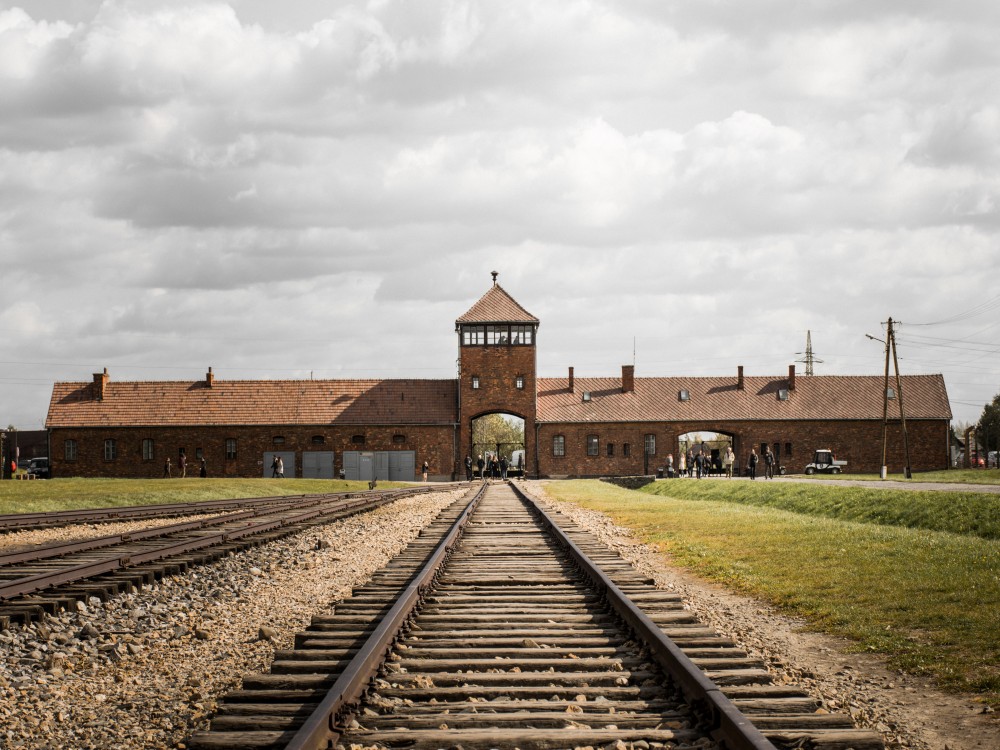From Krakow: Auschwitz-Birkenau Guided Tour & Hotel Pickup | ®ExcursionMania