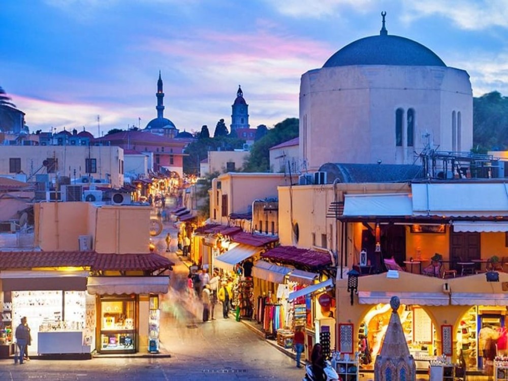 Rhodes: Guided Rhodes City By Night with Live Music & Dinner | ®ExcursionMania