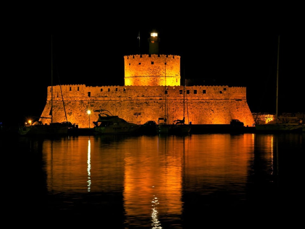 Rhodes: Guided Rhodes City By Night with Live Music & Dinner | ®ExcursionMania