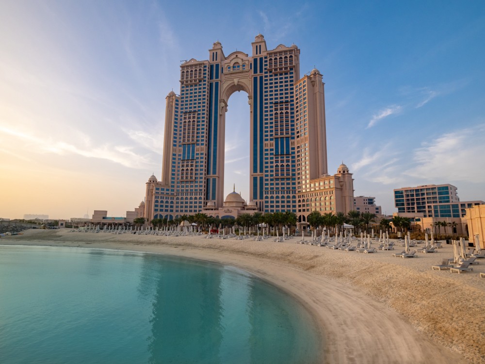 From Abu Dhabi: Grand Mosque Royal Palace and Etihad Tower | ®ExcursionMania