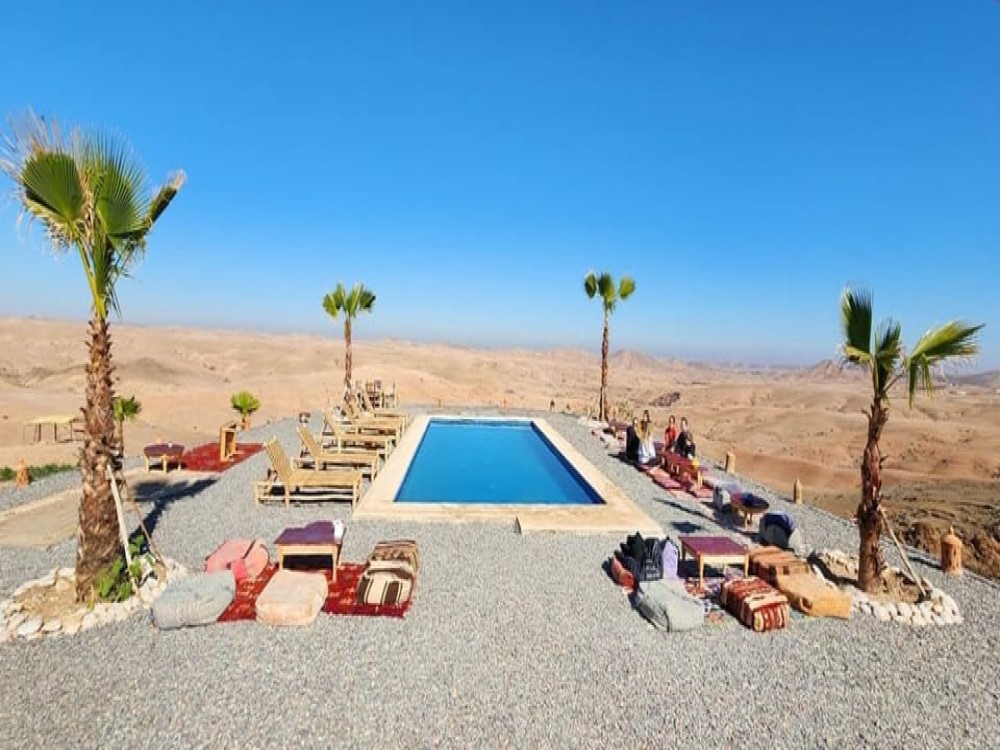 Agafay Desert: Sunset Camel Ride & Moroccan Dinner with Pool | ®ExcursionMania