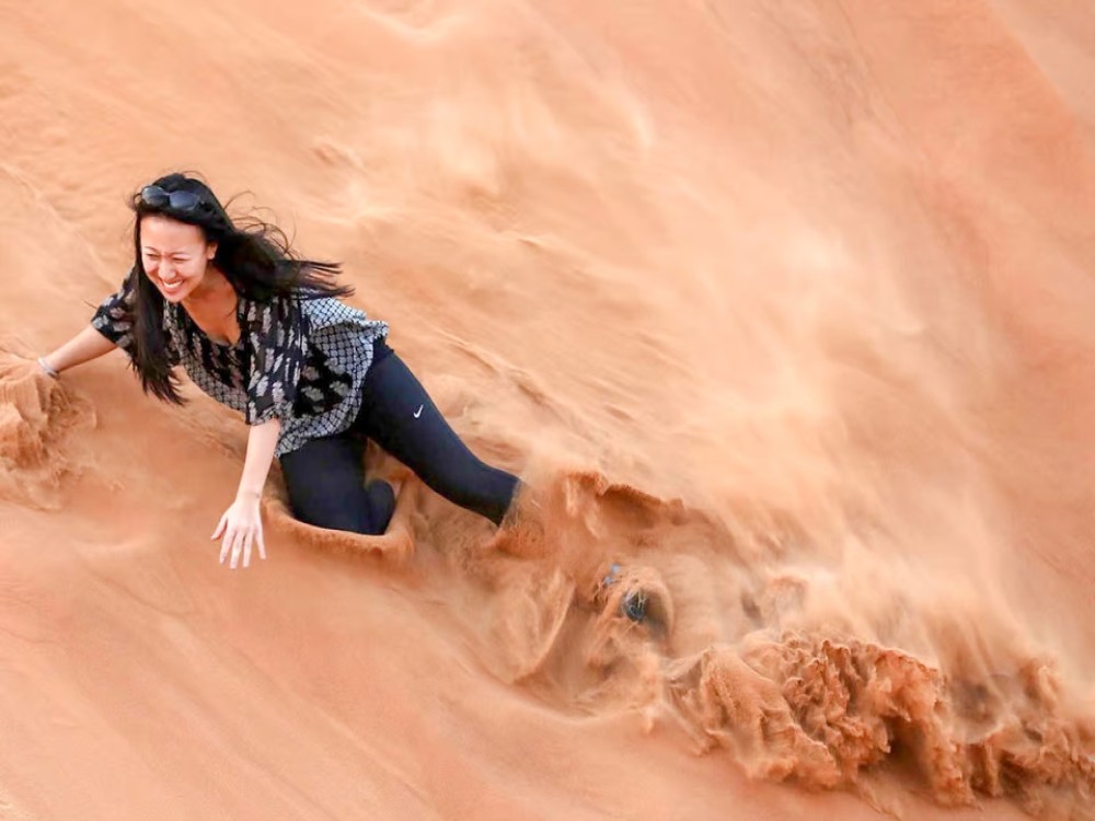 Abu Dhabi: Morning Desert Tour Camel Ride & Sandboarding | ®ExcursionMania