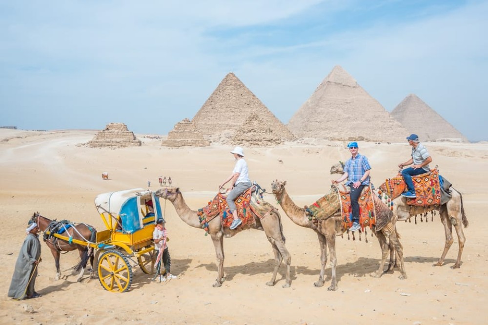 Cairo: Half Day Pyramids Tour by Camel or Horse Carriage | ®ExcursionMania