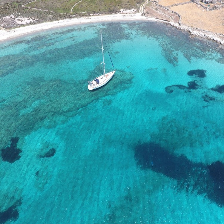 Crystal Waters & Greek Flavors: A Mykonos Sailing Adventure | ®ExcursionMania