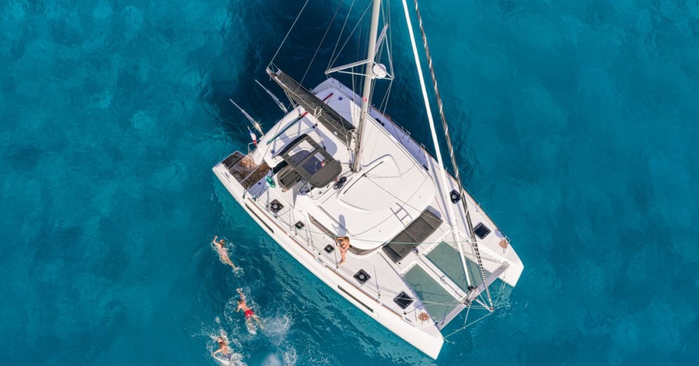 Mykonos Adventure: Private Catamaran Cruise w/ Food Drinks & Transfer | ®ExcursionMania