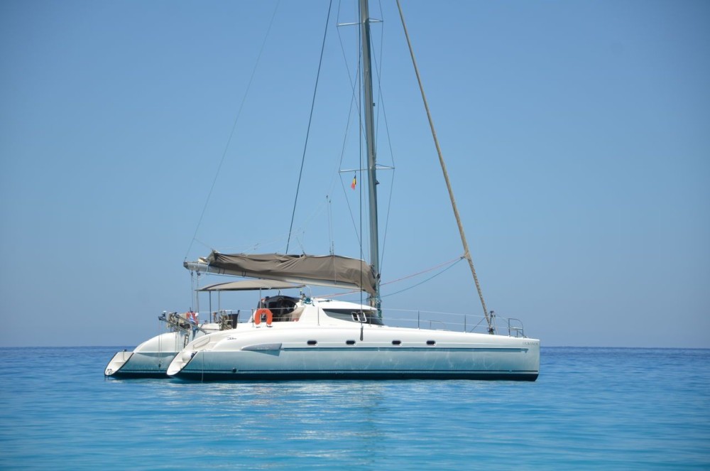 Mykonos Adventure: Private Catamaran Cruise w/ Food Drinks & Transfer | ®ExcursionMania