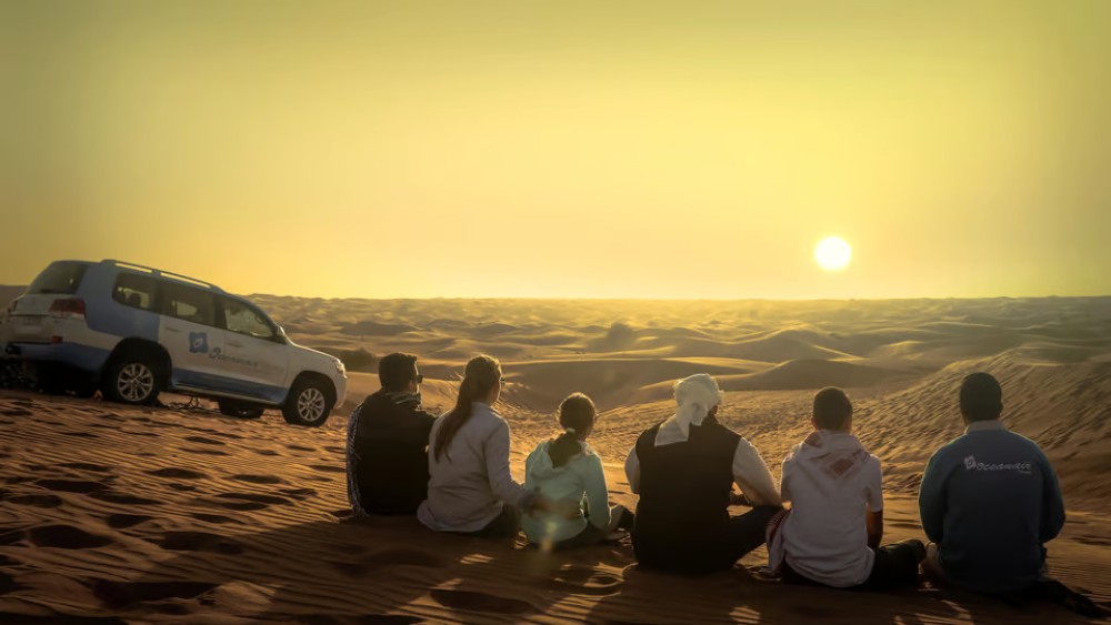 Doha: Sunset Desert Safari with Camel Ride and Sandboarding | ®ExcursionMania