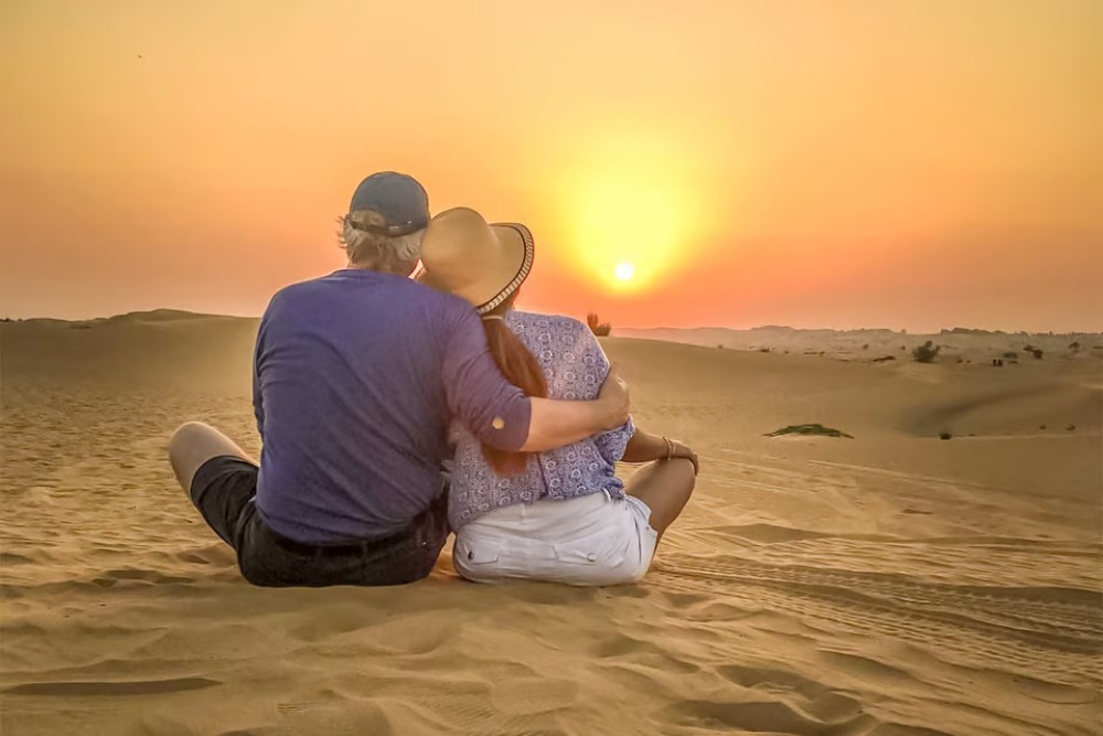 Doha: Sunset Desert Safari with Camel Ride and Sandboarding | ®ExcursionMania