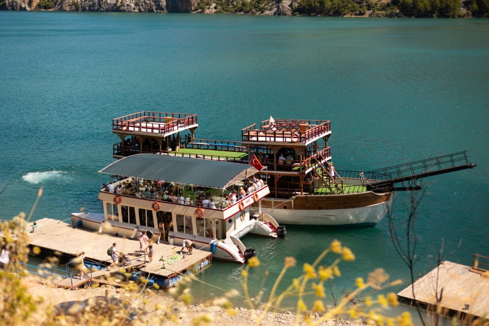 Side: Green Canyon Boat Trip With Unlimited Drinks And Lunch | ®ExcursionMania