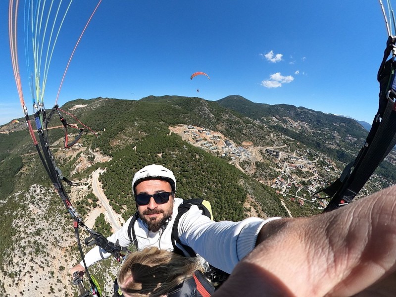 From Antalya: Paragliding Flight at Olympos Tahtali Mountain | ®ExcursionMania