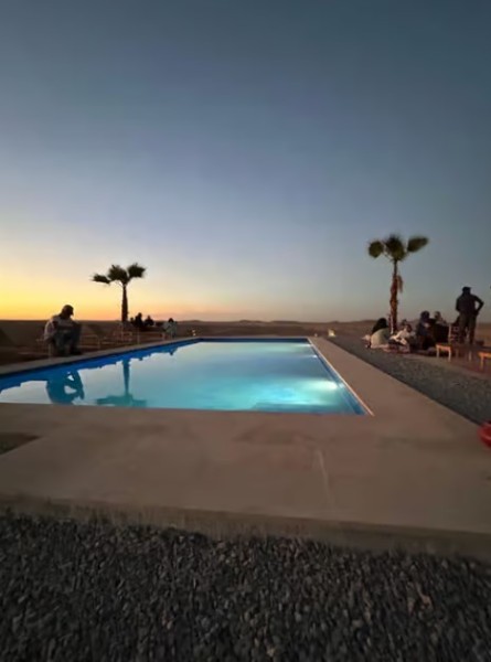 Agafay Desert: Sunset Camel Ride & Moroccan Dinner with Pool | ®ExcursionMania