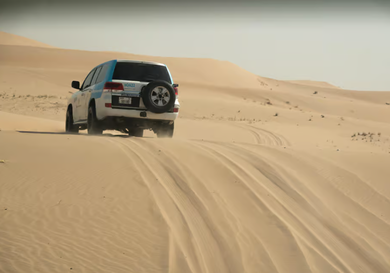 Abu Dhabi: Morning Desert Tour Camel Ride & Sandboarding | ®ExcursionMania